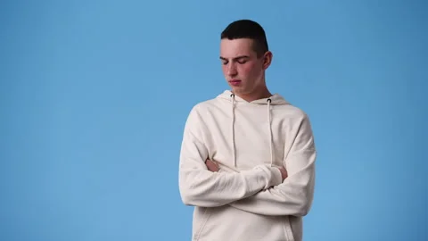 4k video of one man with a negative facial expression who crosses her arms over Stock Footage 240238124