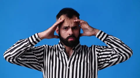 4k video of one man posing for a video over blue background. Stock Footage 235239452
