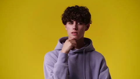 4k video of one man posing for a video over yellow background. Stock Footage 244411897