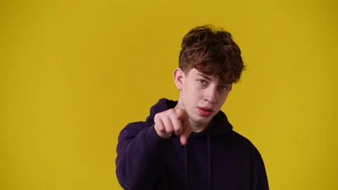 4k video of one man showing thumbs up and smiling over yellow background. Stock Footage 233116752