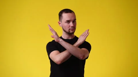 4k video of one man which stopping someone with a negative facial expression Stock Footage 243319979