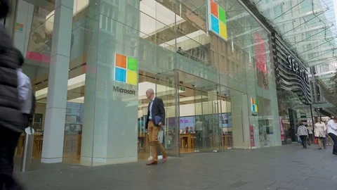 4k video of people visiting the Microsoft flagship store in Sydney Stock Footage 79638636
