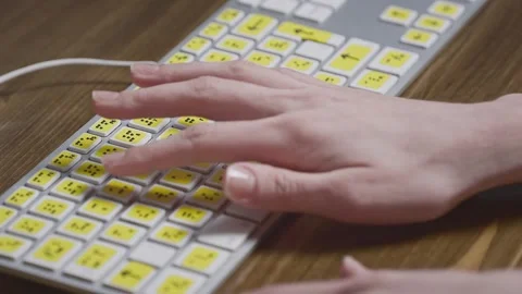 4K Video Person Using Computer Keyboard with Braille Labels Low Vision Video stock 332158017