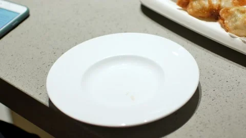 4k video POV using chopstick pick up  gyoza - fried wonton from the plate Stock Footage 162383369