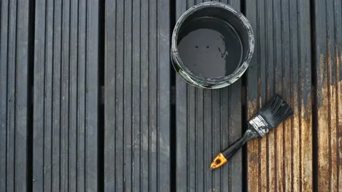 4k Video of Progress on Painted decking, grey paint, isolated brush with paint Stock-Footage 141321423