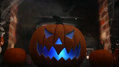 4k video of pumpking changing colours on spooky fire place. wram flickering Stock Footage 140898054