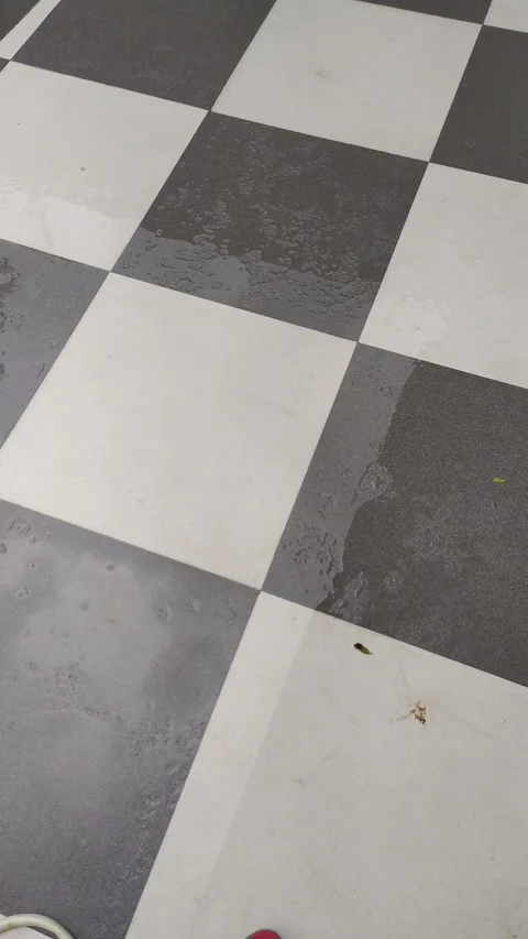 4K Video of rain water fall on the tiles in home floor. Video stock 138032527