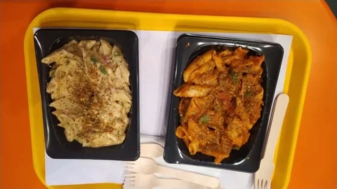 4K Video of red and white pasta. Stock Footage 294983789