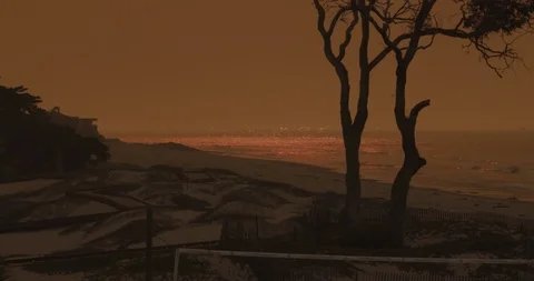 4k Video Red Orange Sky by The Beach Ocean Appears to be on Fire Stock Footage 89140106