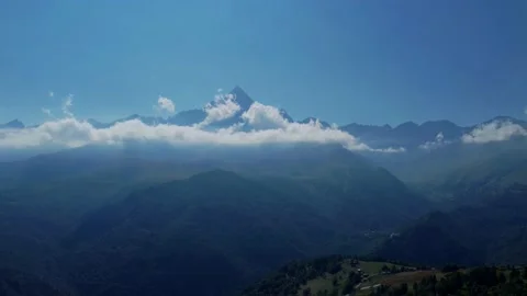 4k video sequence of the Monviso mountain, shrouded in morning fog Stock Footage 162610074