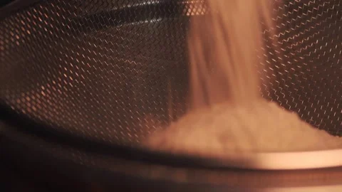 4k video sifting flour with a sifter. Food preparation concept. Stock Footage 262653102