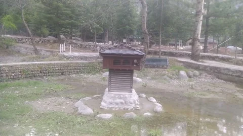 4K Video of small hill temple in a park. Video stock 331451554