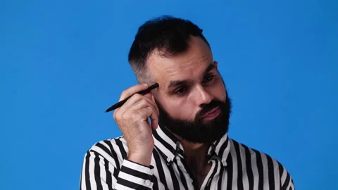 4k video of smiling man over blue background. Video stock 236411436