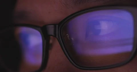 4K video super close up eye ball with eyeglasses reflect coding screen. Backg 스톡 동영상 172777032