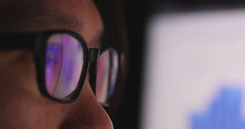 4K video super close up eye ball with eyeglasses reflect coding screen. Backg 스톡 동영상 172777800