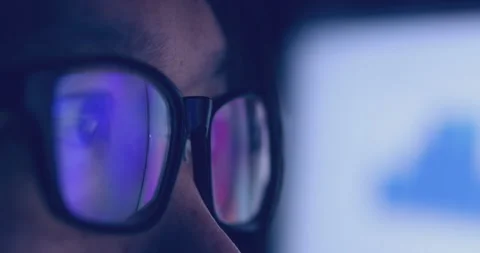 4K video super close up eye ball with eyeglasses reflect coding screen. Backg Video stock 172777813