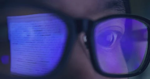 4K video super close up eye ball with eyeglasses reflect coding screen. Backg 스톡 동영상 172777850