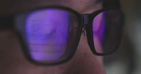 4K video super close up eye ball with eyeglasses reflect coding screen. Backg 스톡 동영상 172779280