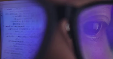 4K video super close up eye ball with eyeglasses reflect coding screen. Backg 스톡 동영상 172785231