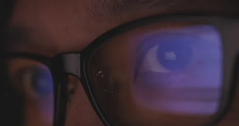4K video super close up eye ball with eyeglasses reflect coding screen. Backg 스톡 동영상 172785246