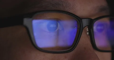 4K video super close up eye ball with eyeglasses reflect coding screen. Backg 스톡 동영상 172788546