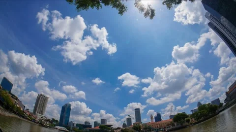 4K Video Time Lapse. A fish eye view of rolling clouds at Singapore city Stock Footage 54720566