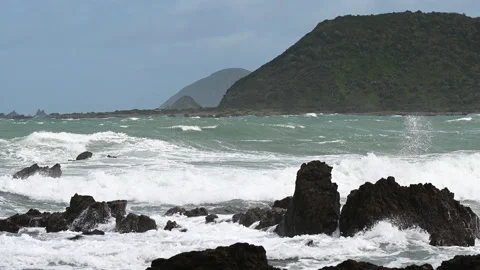 4K video of turquoise  waves of Pacific Ocean in New Zealand Stock Footage 252879735