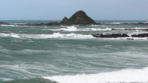 4K video of turquoise  waves of Pacific Ocean in New Zealand Stock Footage 252882560