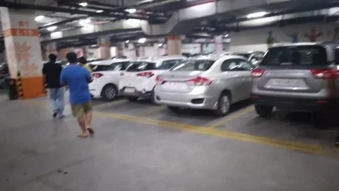 4k video of under ground parking in shopping mall. Stock Footage 248709668