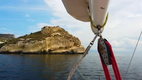 4K video view of sail fluttering in the wind on a yacht in Italy Stock Footage 115569501