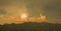 4K Video wide - Majestic thunderhead puffs and dies at sunset in red 4k or 4k+ Resolution