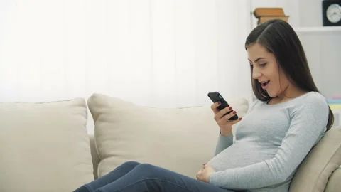 4k video of woman on the sofa using phone. Stock Footage 167934747