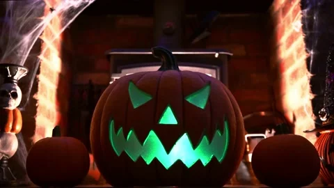 4k vidoe of pumpking changing colours on spooky fire place. wram flickering 스톡 동영상 139823239