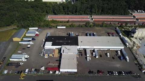 4K The view from the air . The camera shows hangars, automobile enterprises. Stock Footage 128766762