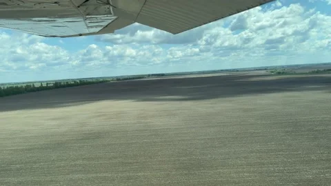 4k View from airplane to the empty fields. Stock Footage 156119507