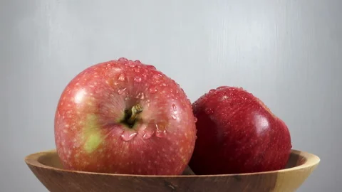4K view of apples rotating on plate Stock Footage 138294380