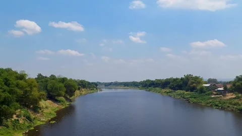 4K View of the Bengawan Solo River Under a Clear Indonesian Sky Stock Footage 318866225