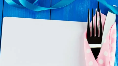 4K view of blank paper with silver fork and knife on the table. Stock Footage 236101656