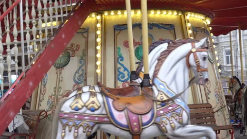 4K view of a carousel with figures of horses Stock Footage 177484116