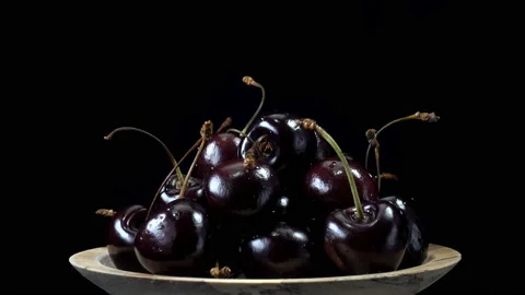 4K view of cherries rotating on plate. Stock Footage 138291468