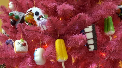4K view of a Christmas tree decorated with toy sweets. Stock Footage 164377315