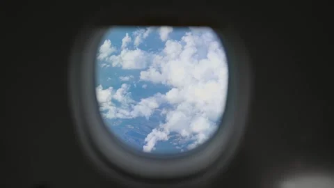 4k view of the cloud from the window of airplane Stock Footage 282894603