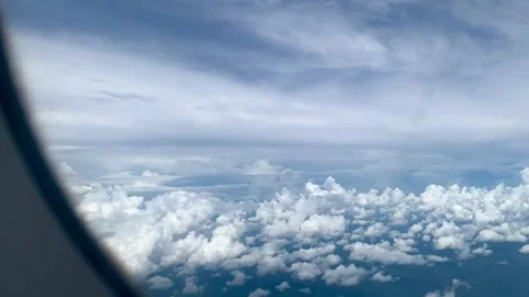 4K View of Clouds From Airplane Window Flying Over Sumatera Island Indonesia Stock Footage 345424795
