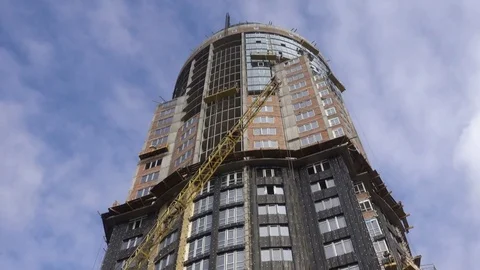 4K view of a Construction Crane and high-rise Building. Stock Footage 82330561
