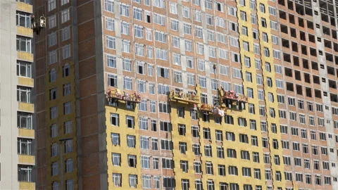 4K view of the construction hoists with workers Stock Footage 114294655