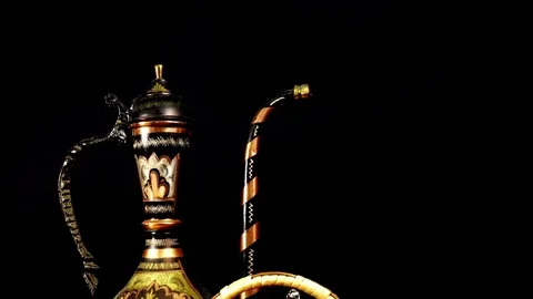 4K view of copper oriental jug, kettle, cups and coffee beans in a basket Stock Footage 84672273