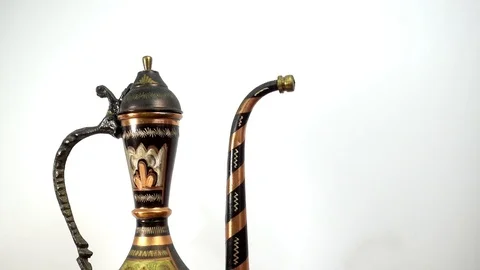 4K view of copper oriental jug, kettle, cups and coffee beans Stock Footage 84675763