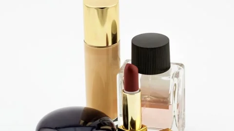 4K view of cosmetics set of lipstick with perfume and foundation Stock Footage 236092645