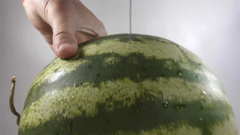 4K view of cutting a watermelon with a knife Stock Footage 138796068
