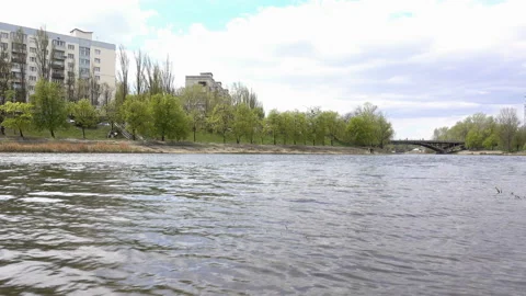 4K view of the Dnieper River and buildings. Stock Footage 131041803